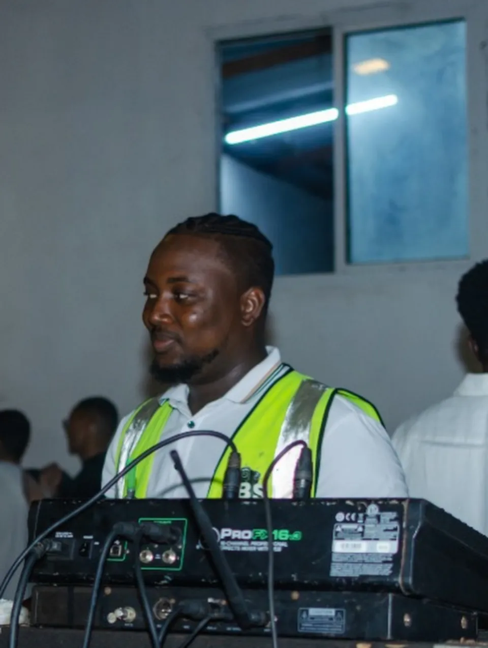 A sound technician at the mixing desk during The Hangawt